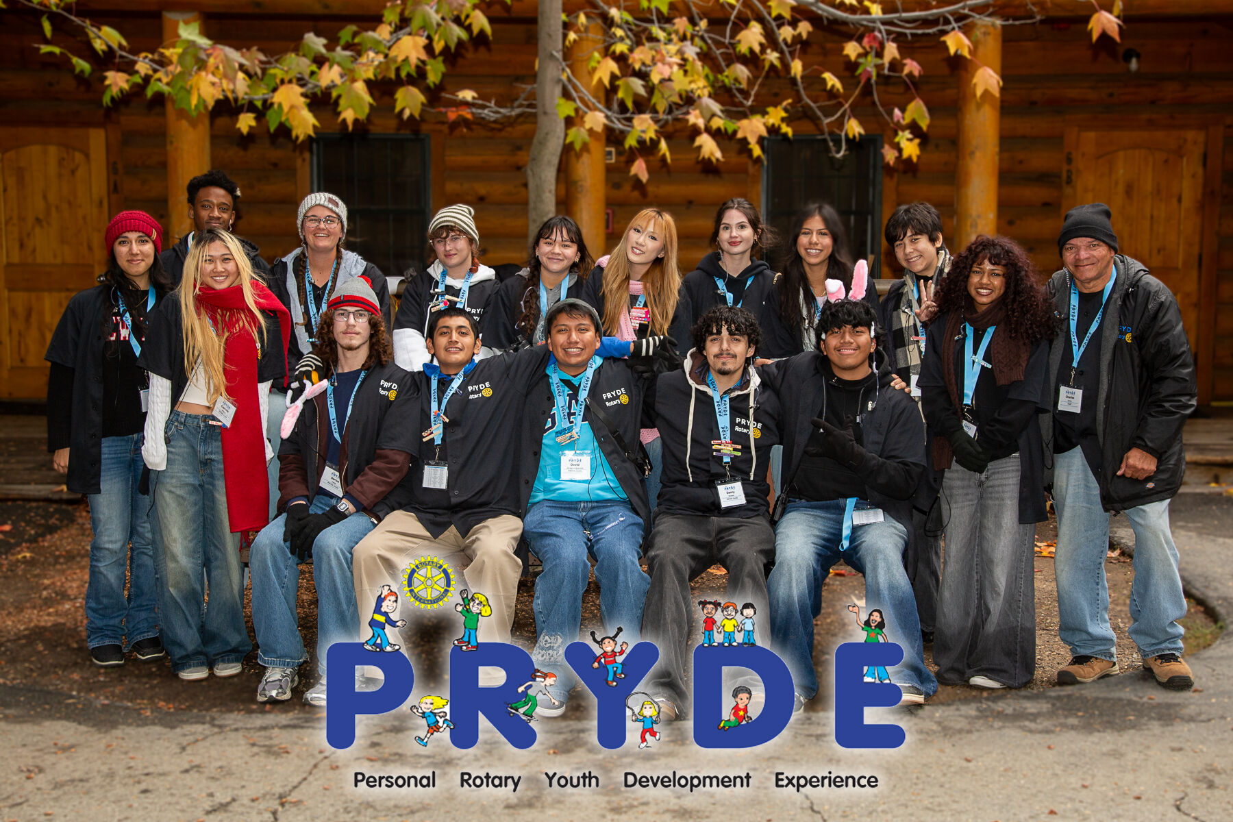 The PRYDE Guides team outside a cabin at Thousand Pines